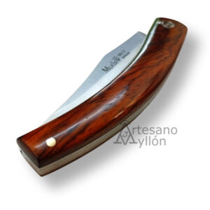 Navaja Muela P-8LCO cerrada con mango de cocobolo brillante y hoja parcialmente visible.